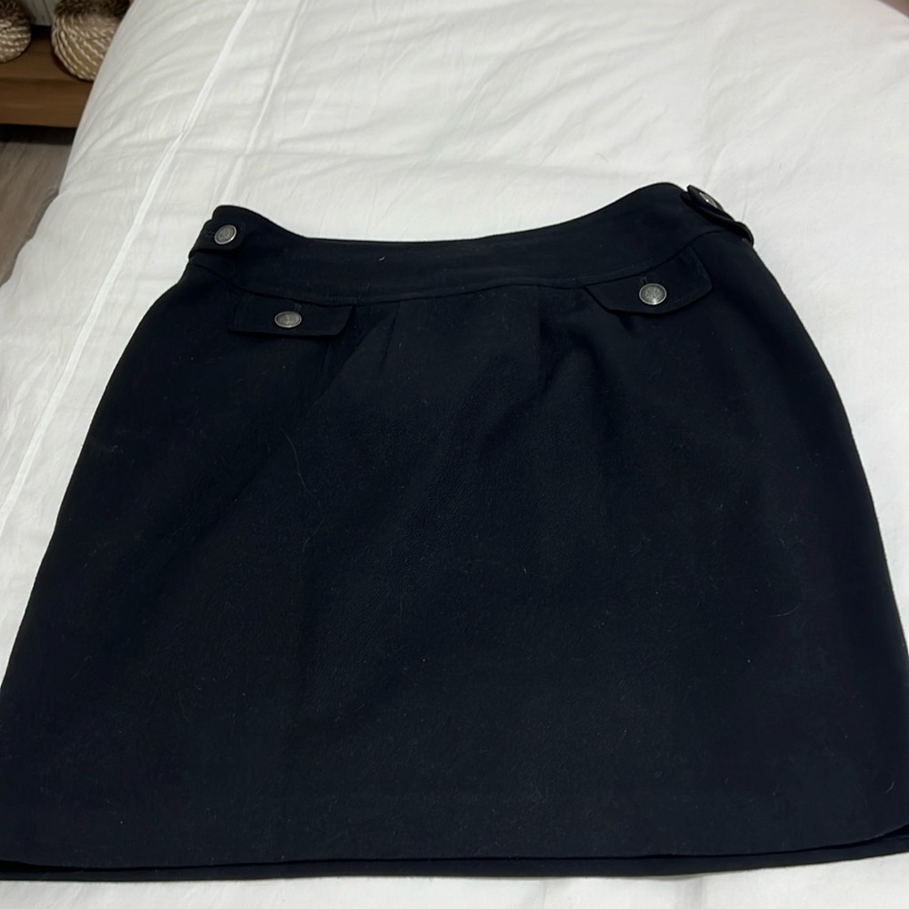 Banana Republic wool/poly mini skirt. Fully lined & side zipper. Size 14